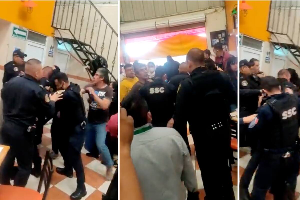 VIDEO: Policías y civiles se agarran a golpes en una taquería de la CDMX