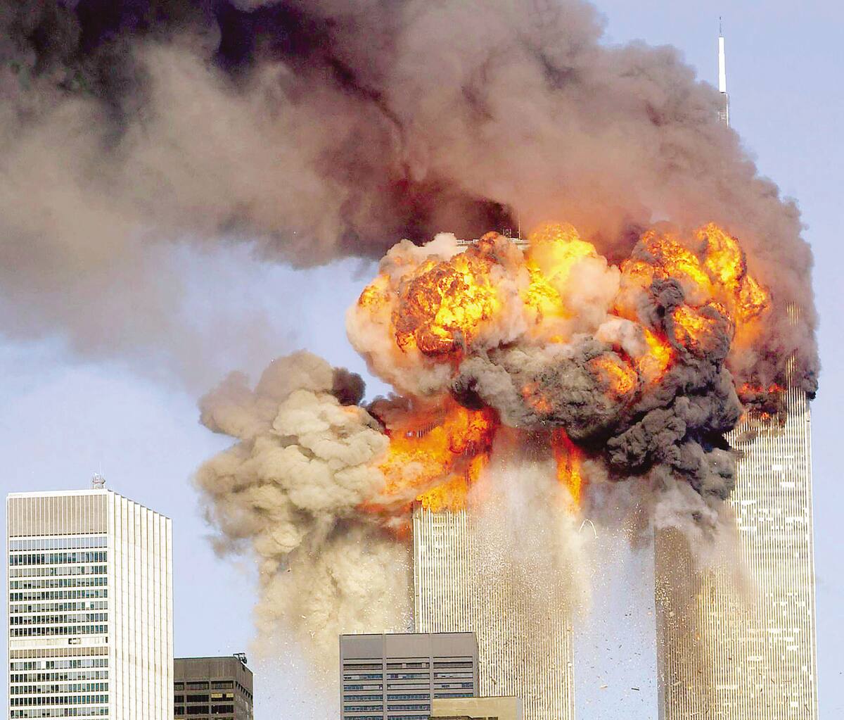 394261 12: (GERMANY OUT/NEWSWEEK OUT/US NEWS&WORLD REPORT OUT) A fiery blasts rocks the World Trade Center after being hit by two planes September 11, 2001 in New York City. (Photo by Spencer Platt/Getty Images)