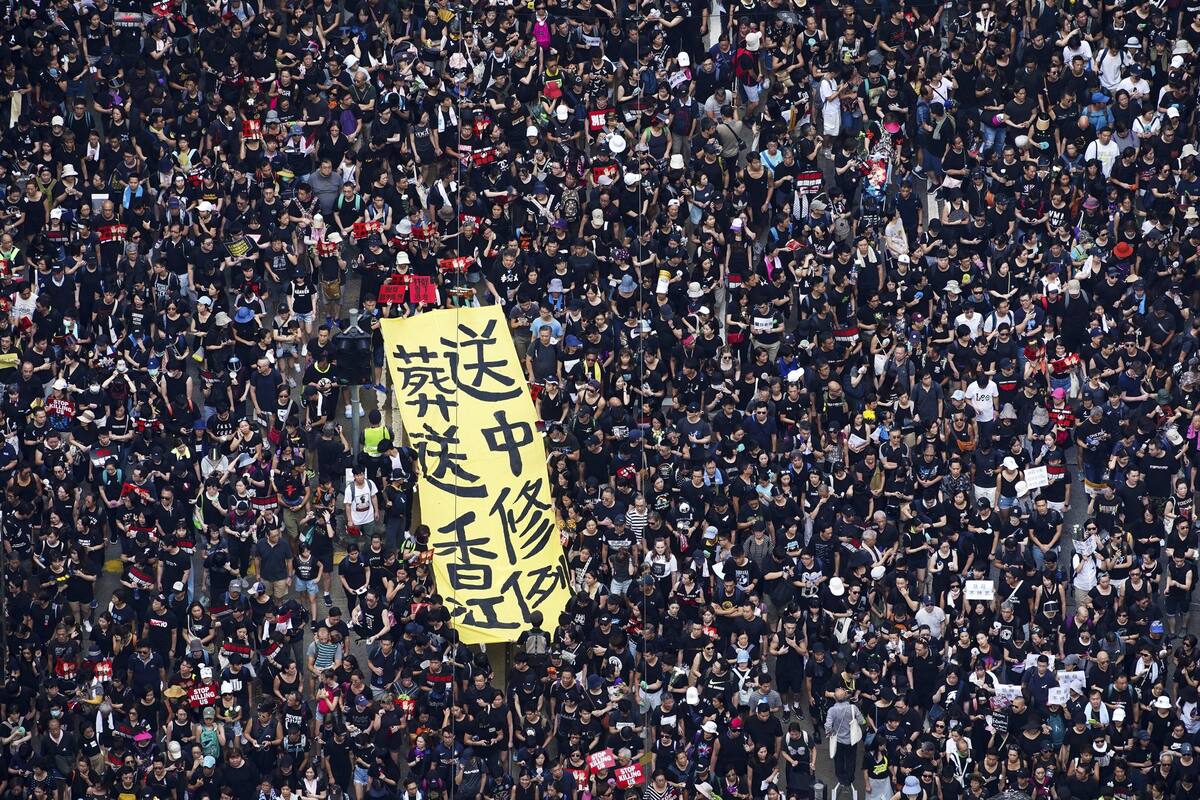 Gran marcha en Hong Kong busca presionar a líder