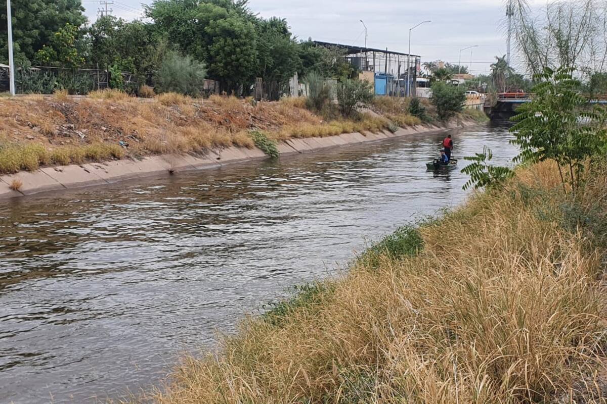 Encuentran cuerpo flotando en canal Las Pilas