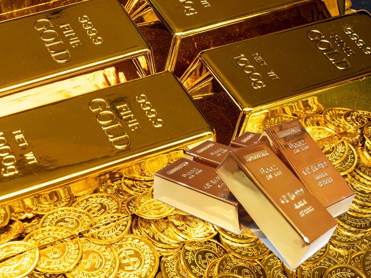 El precio del oro rompe el récord histórico de los 5,000 dólares mientras el conflicto diplomático por Groenlandia y la debilidad del dólar desatan una compra masiva de metales