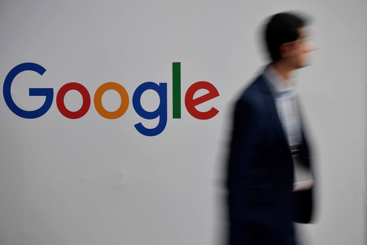 epa07575961 A man passes by a Google logo during the Vivatech startups and innovation fair, in Paris, France, 16 May 2019. Acording to organizers, VivaTech is the 'world's rendezvous for startups and leaders to celebrate innovation'. It aims to gather the world's brightest minds, talents, and products taking place in Paris on 16 to 18 May 2019. EPA/Julien de Rosa