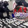 Hallan en autobús de Ayotzinapa 59 artefactos explosivos caseros y liberan paso tras revisión en caseta de Tlalpan