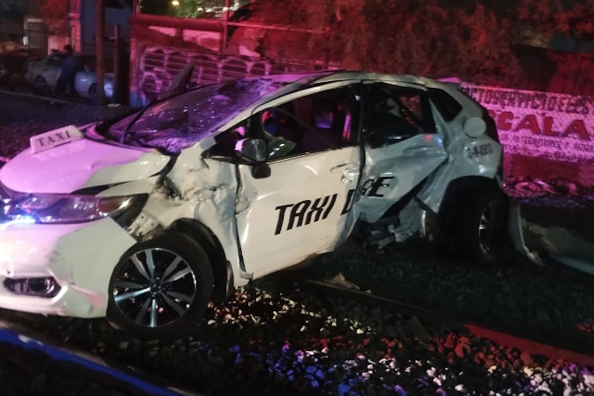 Taxista resulta lesionado tras intentar ganarle el paso al tren