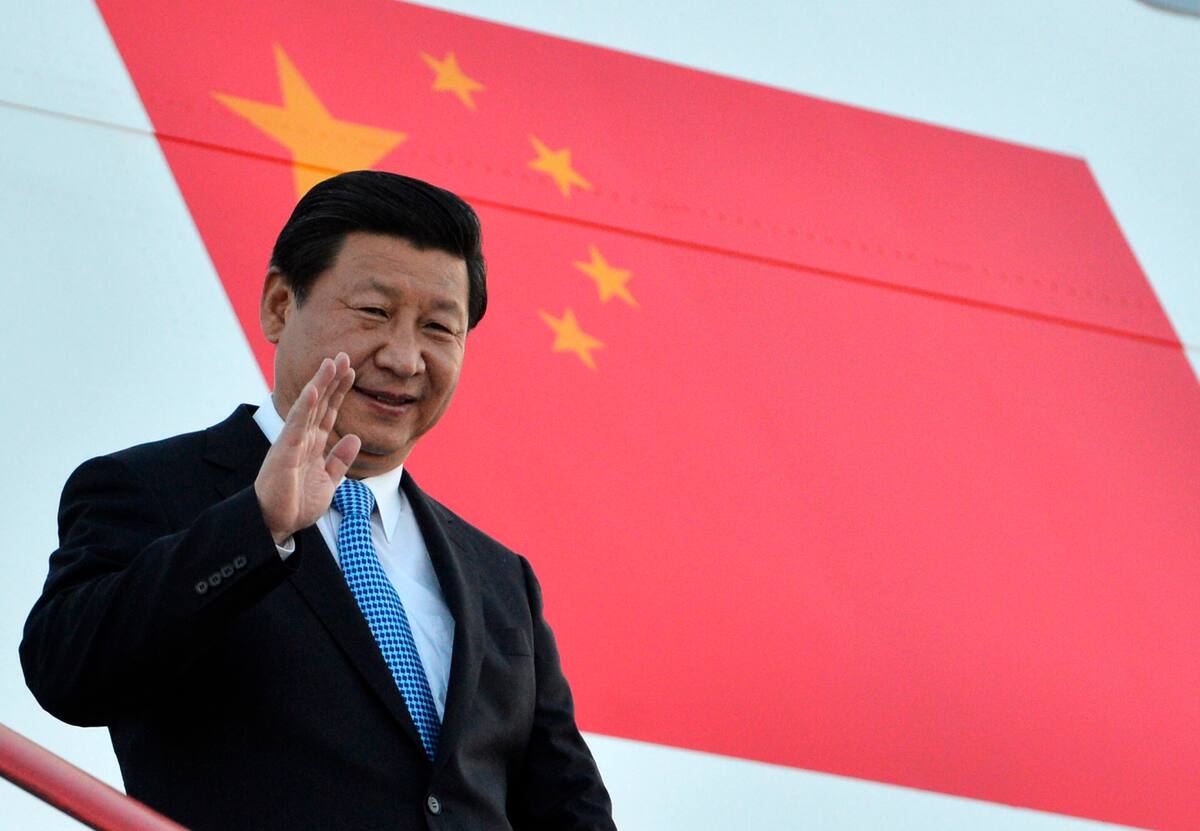 In this photograph provided by the G20 host broadcaster, China's President Xi Jinping waves as he arrives in St. Petersburg, Russia on Wednesday, Sept. 4, 2013. U.S. President Barack Obama will seek to bolster international support for a strike against Syria during talks with world leaders this week at the Group of 20 summit. Those efforts will pit him against Russian president and summit host Vladimir Putin, who has perhaps done the most to stymie international efforts to oust Syria's Bashar Assad. The G20 summit begins on Thursday, Sept. 5. (AP Photo/g20Russia)