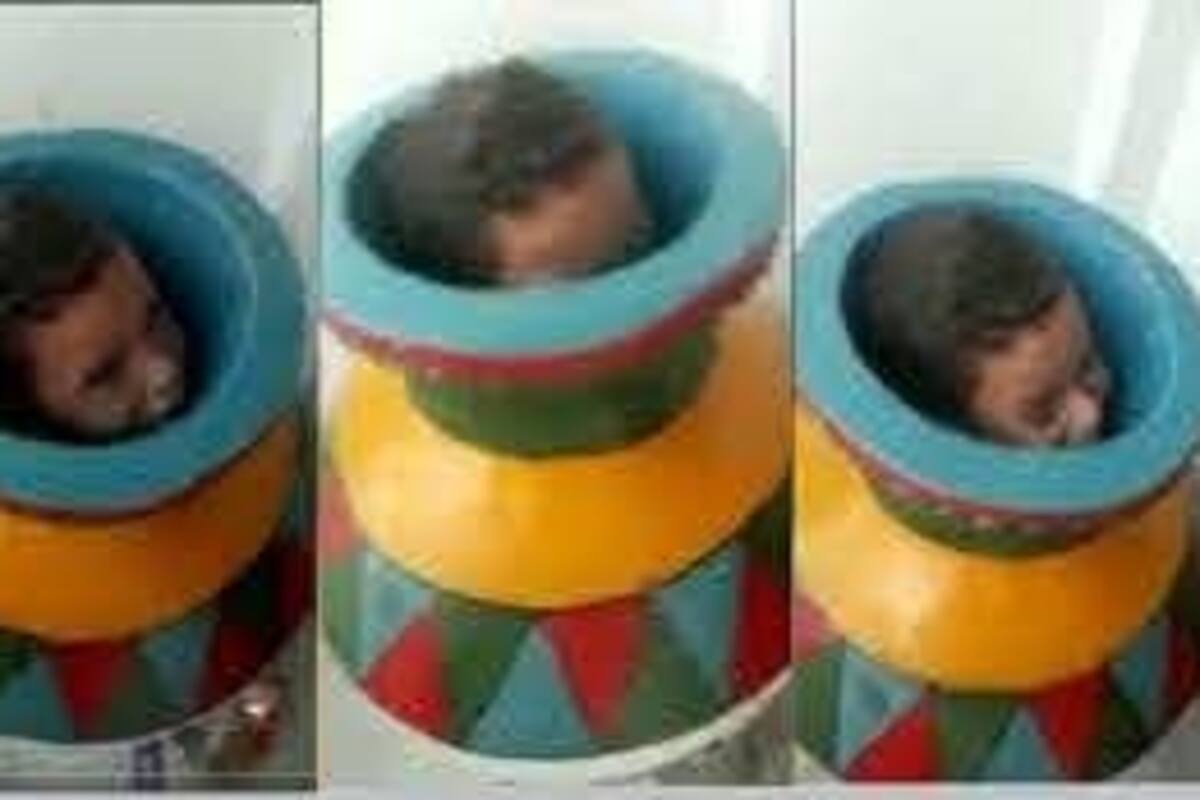 Niño queda atrapado en un jarrón