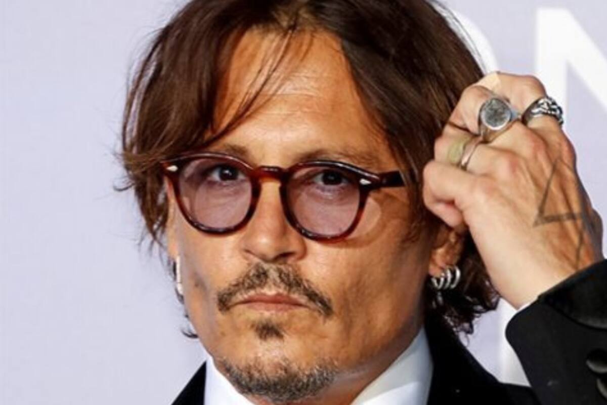 ¿Nuevo romance?, Captan a Johnny Depp con una misteriosa mujer