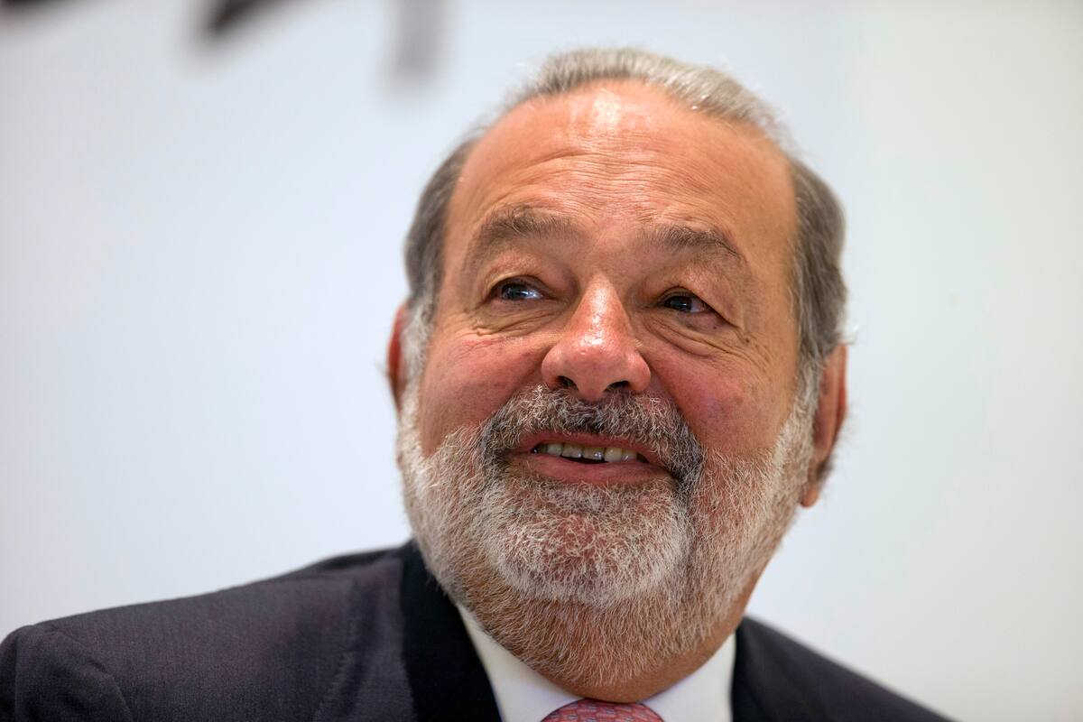 FILE - In this Jan. 14, 2013 file photo, Mexican telecommunications tycoon Carlos Slim Helu speaks during news conference at the Soumaya museum in Mexico City. Slim took second place behind Bill Gates on Forbes' list of billionaires with a net worth of $77.1 billion. He had topped the list in 2013. (AP Photo/Dario Lopez-Mills, File)