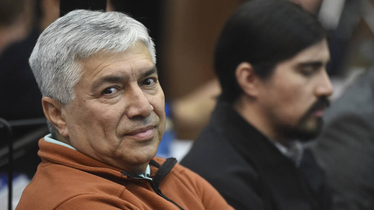 Argentine businessman Lazaro Baez (L) and his son Martin attend their trial on money laundering charges at the Comodoro Py federal courts in Buenos Aires on October 30, 2018. - The case known as "The K-Money Route" centres around Lazaro Baez, a former bank cashier who created a business empire in Santa Cruz, some 2,500 kilometres (1,500-miles) south of the capital Buenos Aires, where he won tenders for oil and public works during the Kirchners' presidencies from 2003 to 2015. (Photo by Eitan ABRAMOVICH / AFP) (Photo by EITAN ABRAMOVICH/AFP via Getty Images)