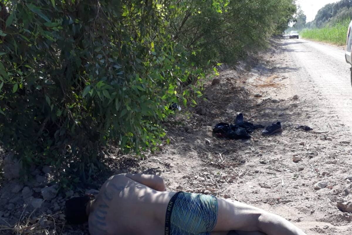 Encuentran muerto a hombre al costado de un canal