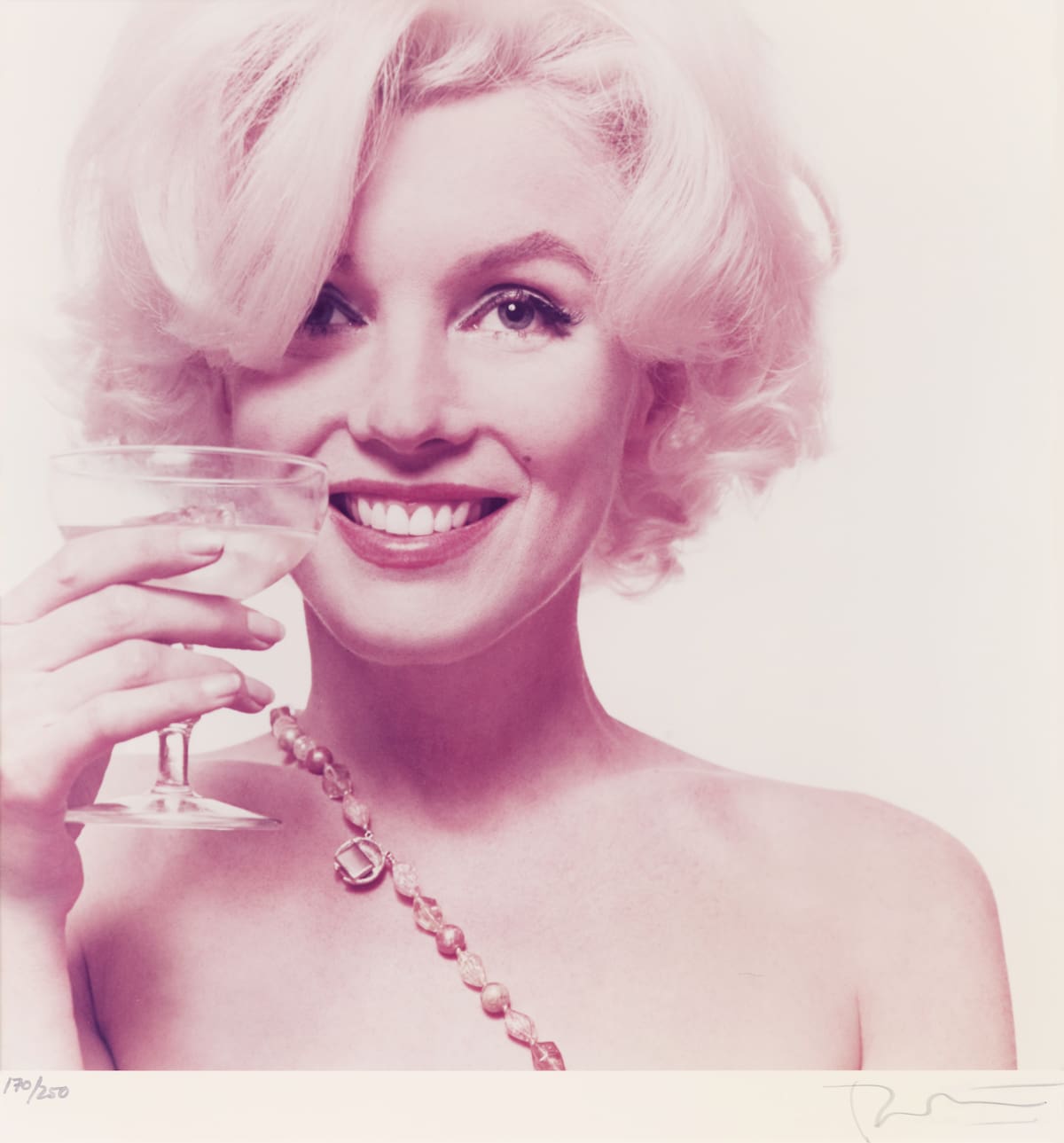 This 1962 photo provided by Freemans auction house in Philadelphia shows one of a limited-edition portfolio of 10 photos of Marilyn Monroe that is scheduled to go on the block Tuesday, Sept. 10, 2013. The photos were made from fashion photographer Bert Sterns original negatives from his June 1962 assignment for Vogue. (AP Photo/Freemans, Bert Stern)