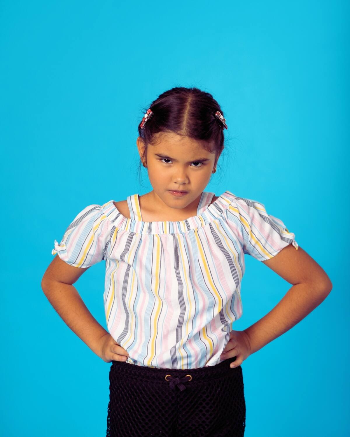 Niña desafiante. Foto: Canva