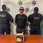 Intenta asaltar una tienda con una pistola y huye al llegar la policía