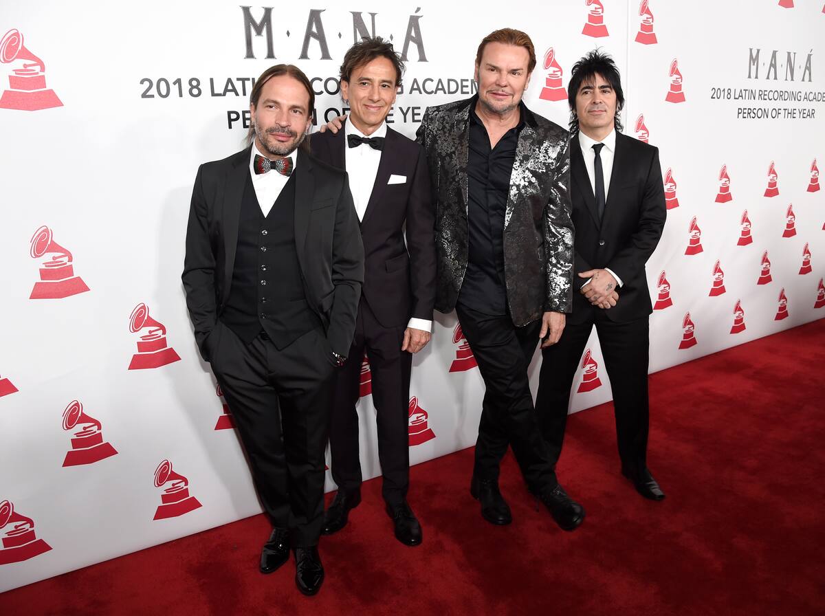 Sergio Vallin, from left, Juan Calleros, Fher Olvera and Alex Gonzalez, of Mana, arrive at the Latin Recording Academy Person of the Year gala in their honor at the Mandalay Bay Events Center on Wednesday, Nov. 14, 2018. (Photo by Chris Pizzello/Invision/AP)