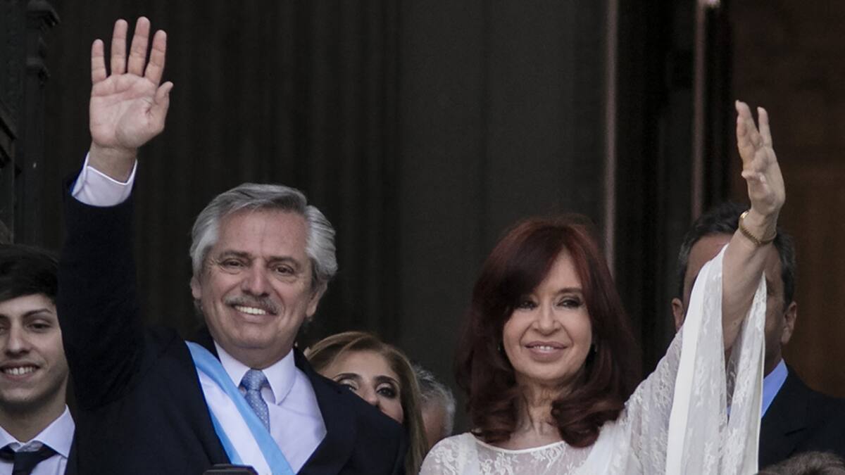 BUENOS AIRES, ARGENTINA - DECEMBER 10: (FROM L TO R) First Lady Fabiola Yañez, Argentina President-elect Alberto Fernandez and Argentina Vice President-elect Cristina Fernandez greet the crowd after the Presidential Inauguration at National Congress on December 10, 2019 in Buenos Aires, Argentina. (Photo by Ricardo Ceppi/Getty Images)